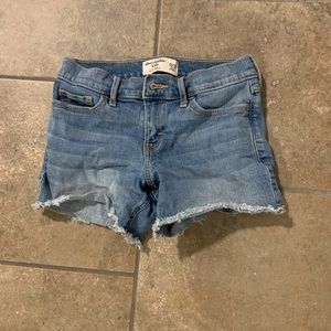Blue Abercrombie Kids girls midi jean shorts
